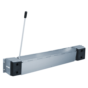 Edge-of-dock leveler at commercial facility