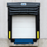 Vehicle restraint systems at commercial dock