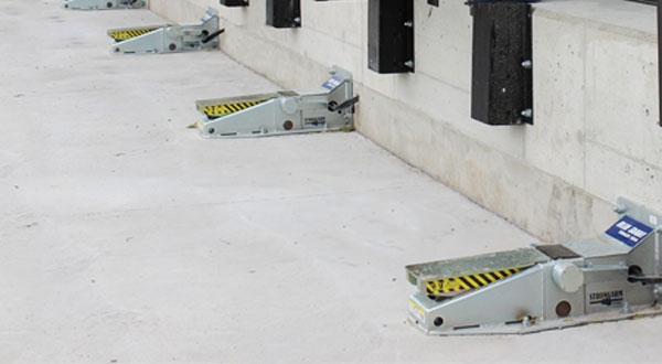 Safety dock bumpers in industrial loading zone